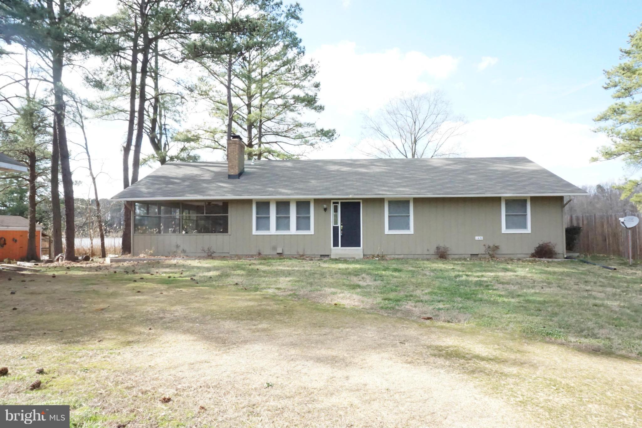 11670 Perry Branch Road Newburg, MD 20664 - Photo 28 of 30 a front view of a house with a garden