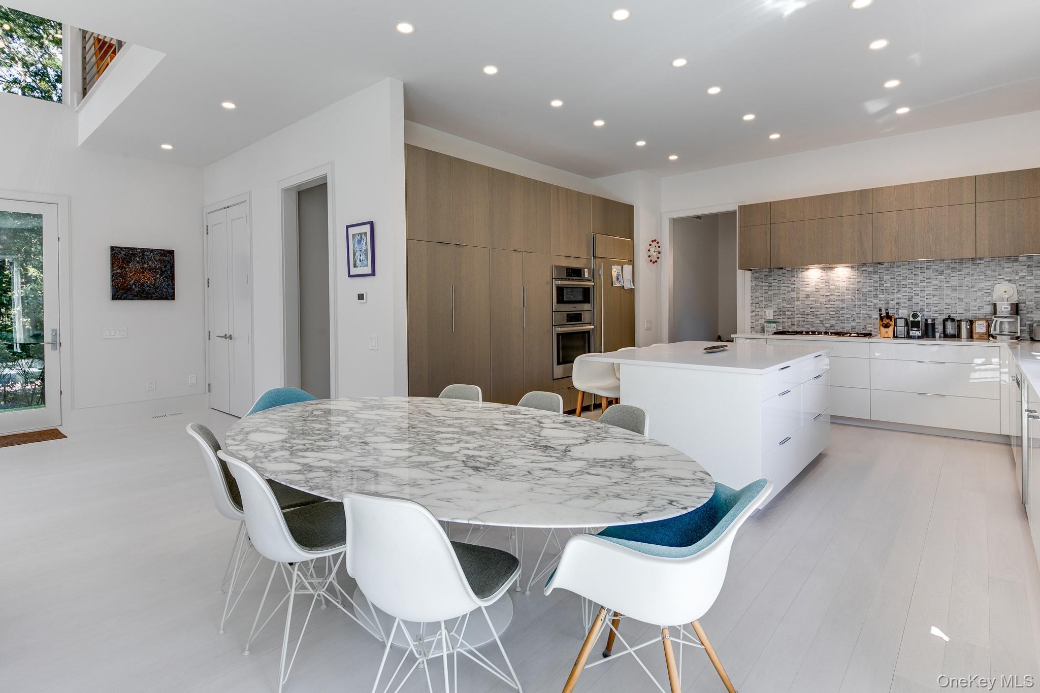 70 Cove Hollow Road East Hampton, NY 11937 - Photo 12 of 21 Dining area featuring recessed lighting and light wood-style floors