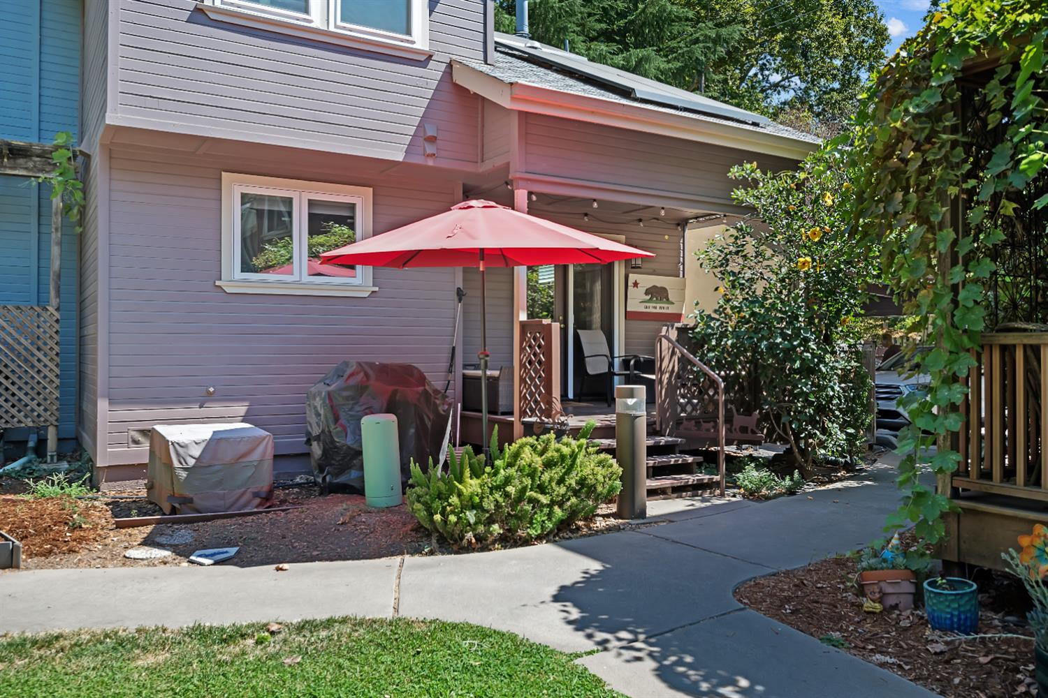 2008 5th Street, Unit 15 Sacramento, CA 95811 - Photo 24 of 49 a view of a patio with chairs and potted plants