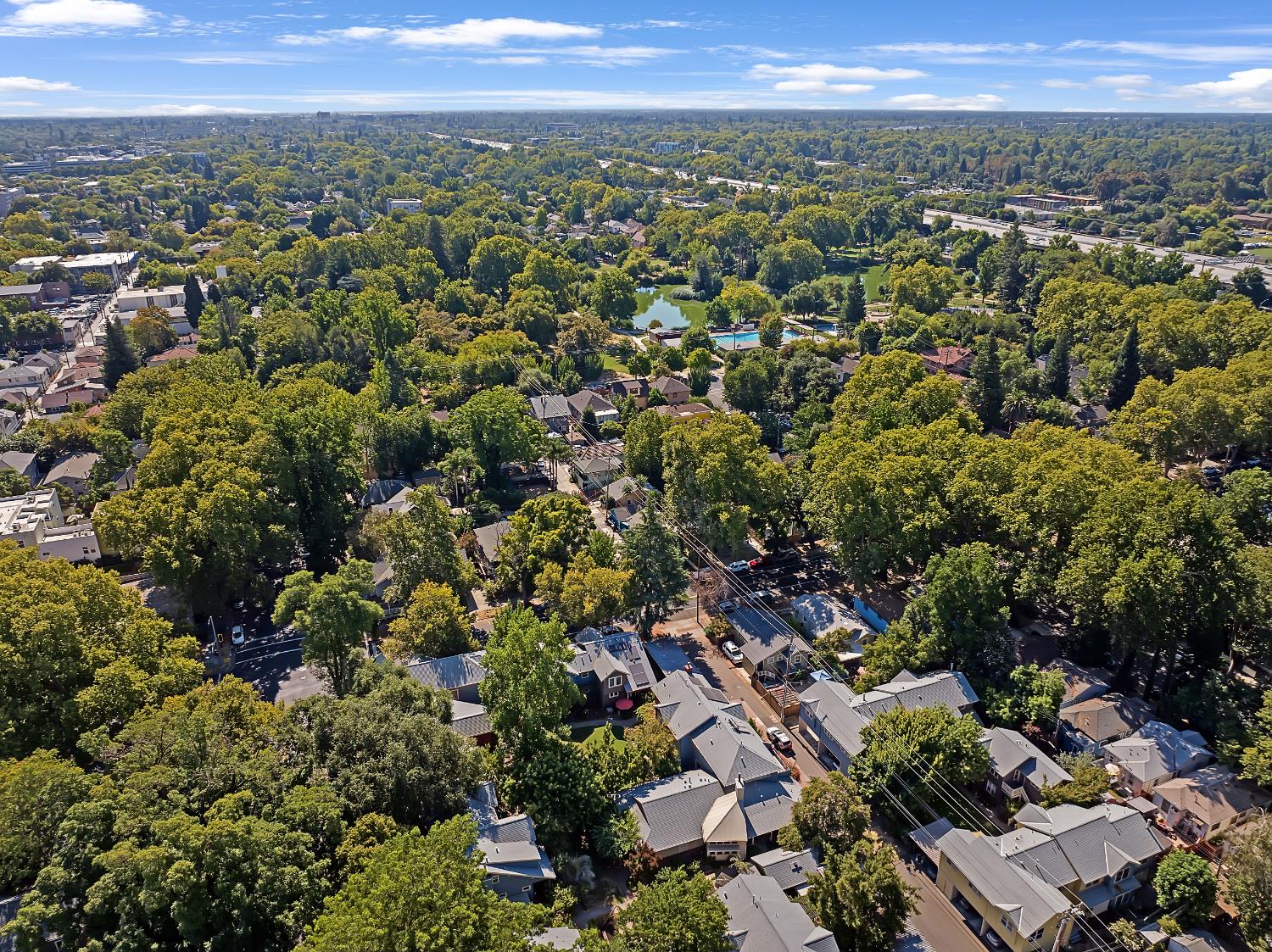 2008 5th Street, Unit 15 Sacramento, CA 95811 - Photo 45 of 49 an aerial view of residential houses with outdoor space and trees