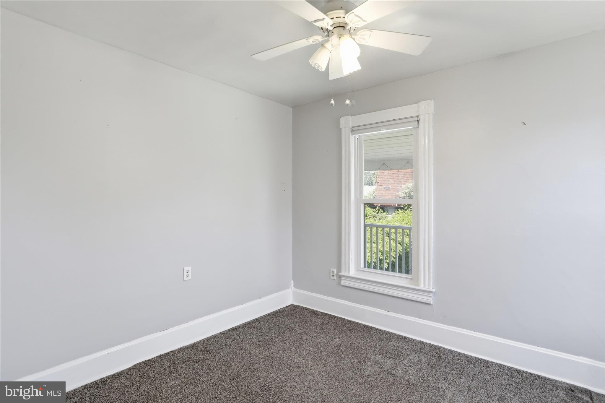21 Sharpless Street Keyser, WV 26726 - Photo 17 of 33 an empty room with windows and fan