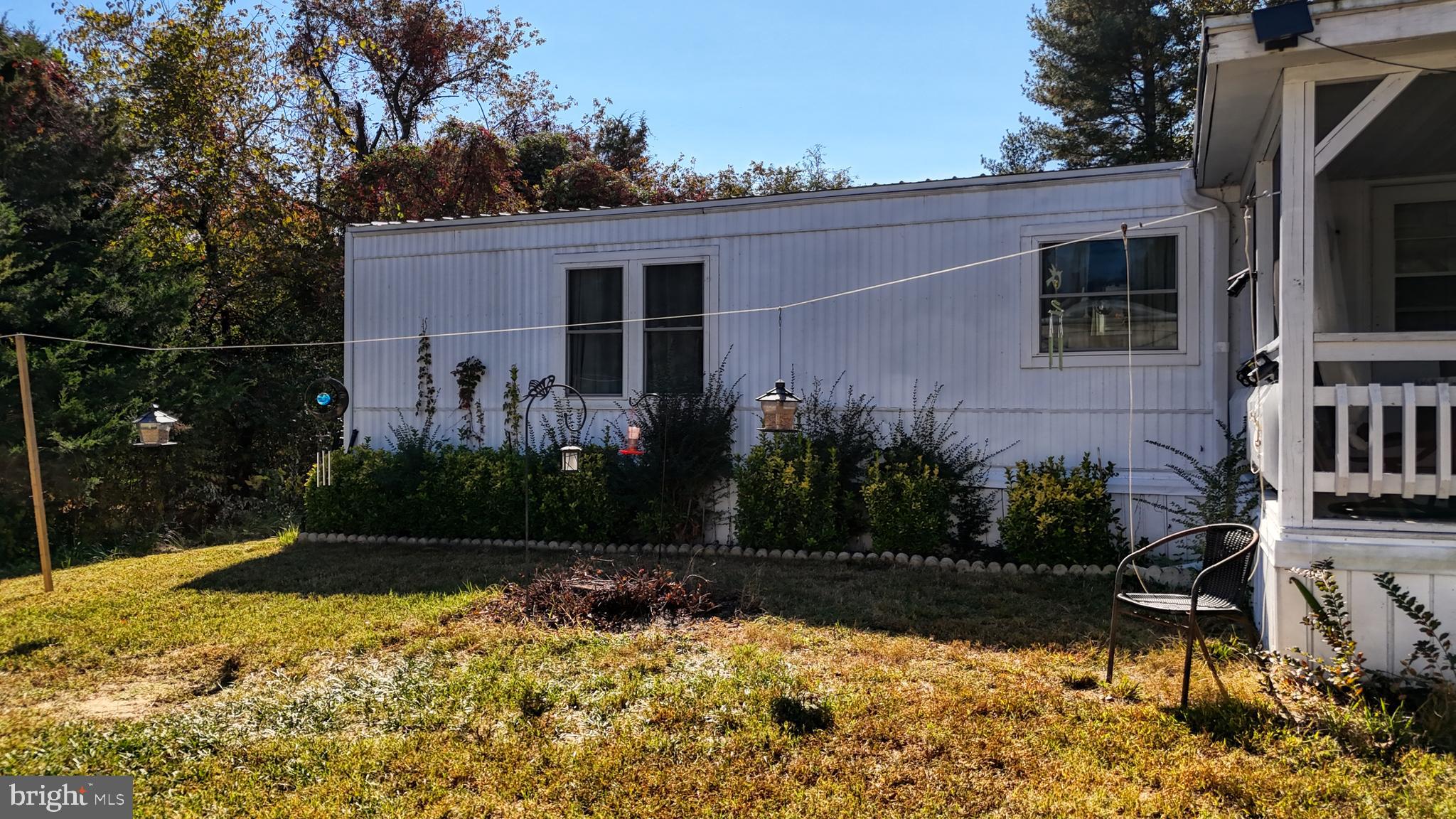 17261 Ridge Line Drive, Unit 18007 Lewes, DE 19958 - Photo 12 of 38 a view of house with backyard and garden
