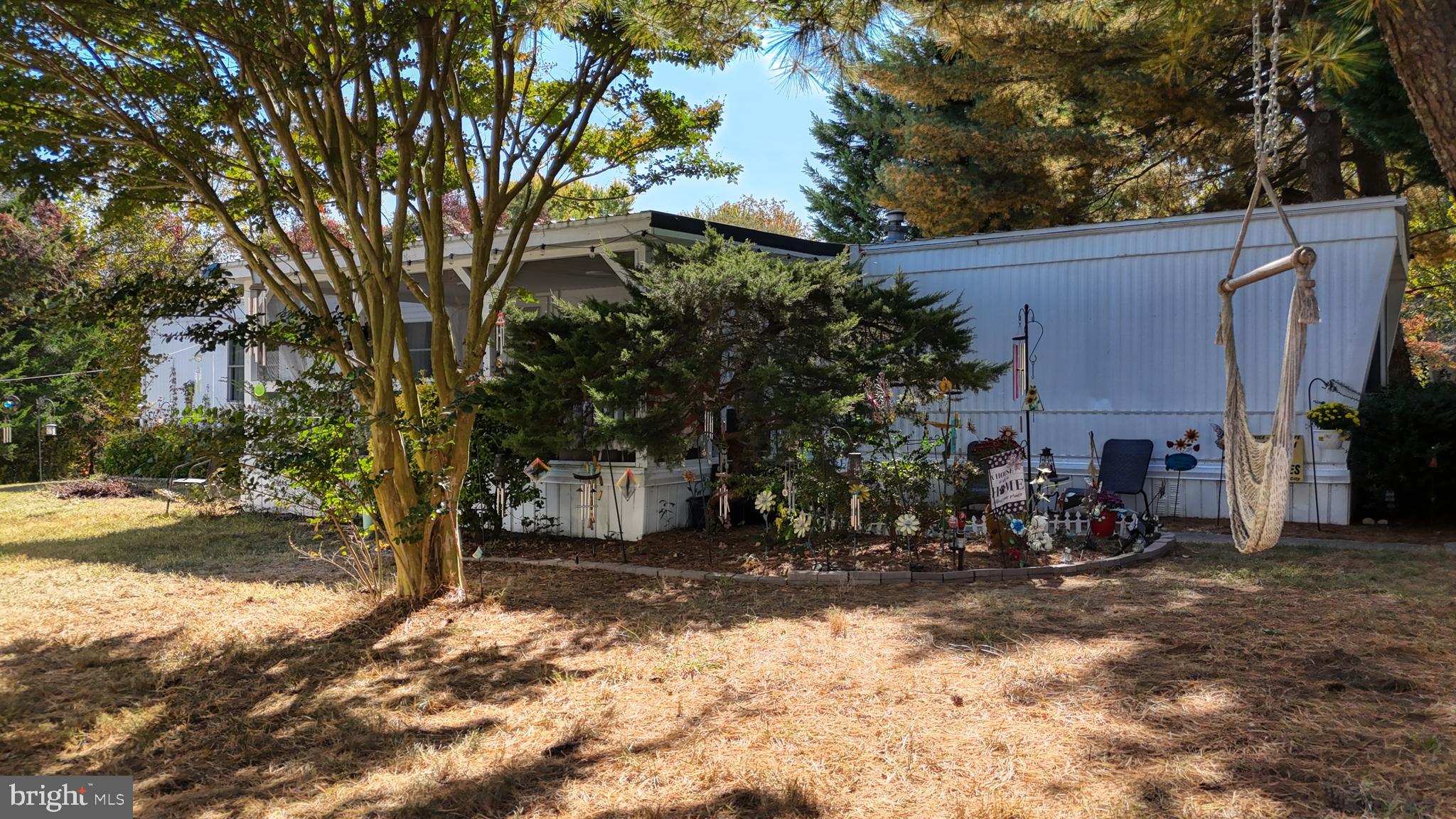 17261 Ridge Line Drive, Unit 18007 Lewes, DE 19958 - Photo 14 of 38 a view of a house with a yard