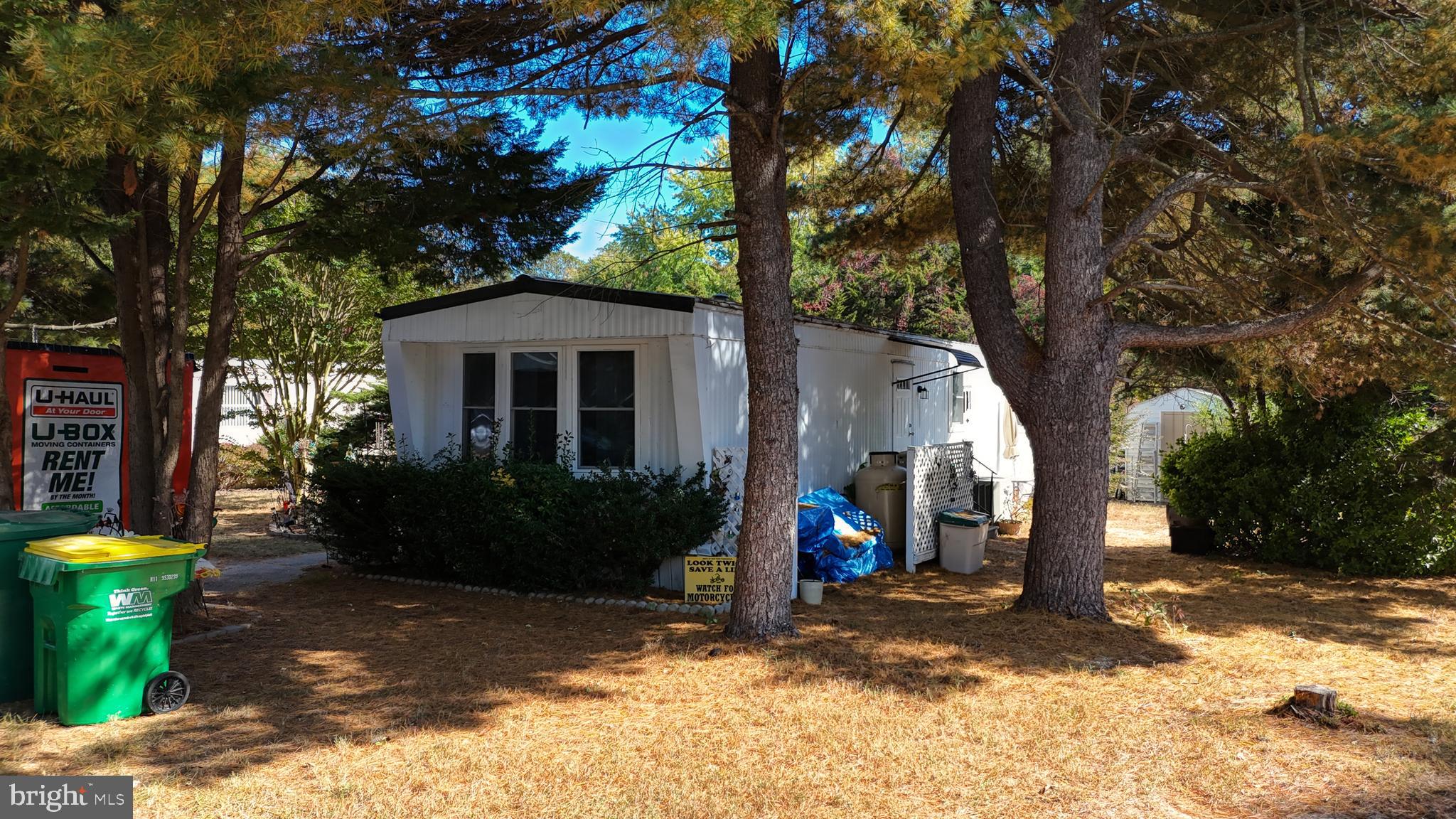 17261 Ridge Line Drive, Unit 18007 Lewes, DE 19958 - Photo 15 of 38 a view of a house with backyard