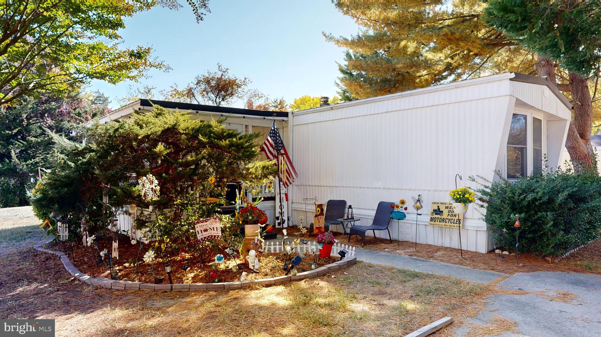 17261 Ridge Line Drive, Unit 18007 Lewes, DE 19958 - Photo 20 of 38 a view of outdoor space and porch