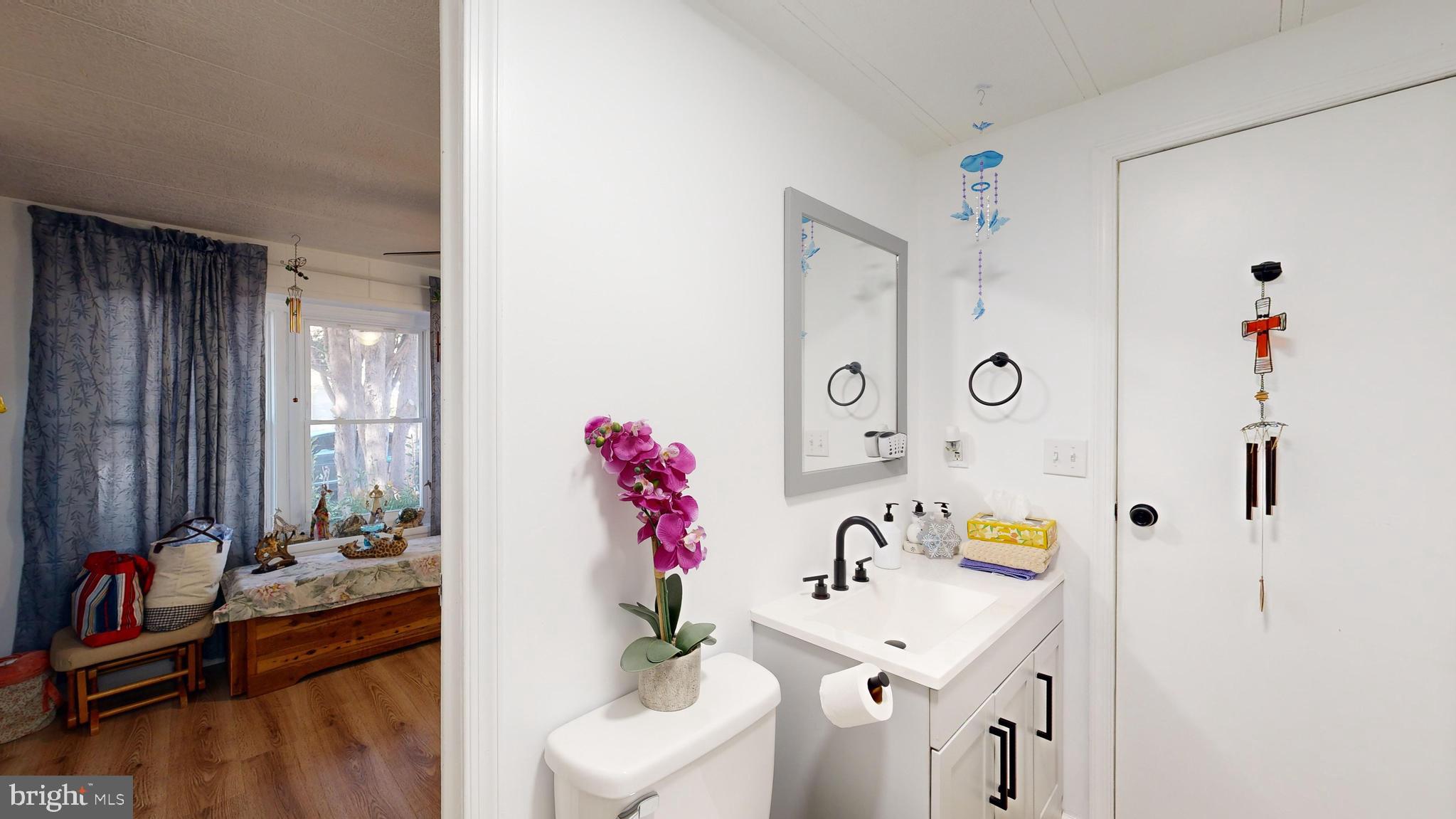 17261 Ridge Line Drive, Unit 18007 Lewes, DE 19958 - Photo 22 of 38 a very nice looking room with a dining table chairs