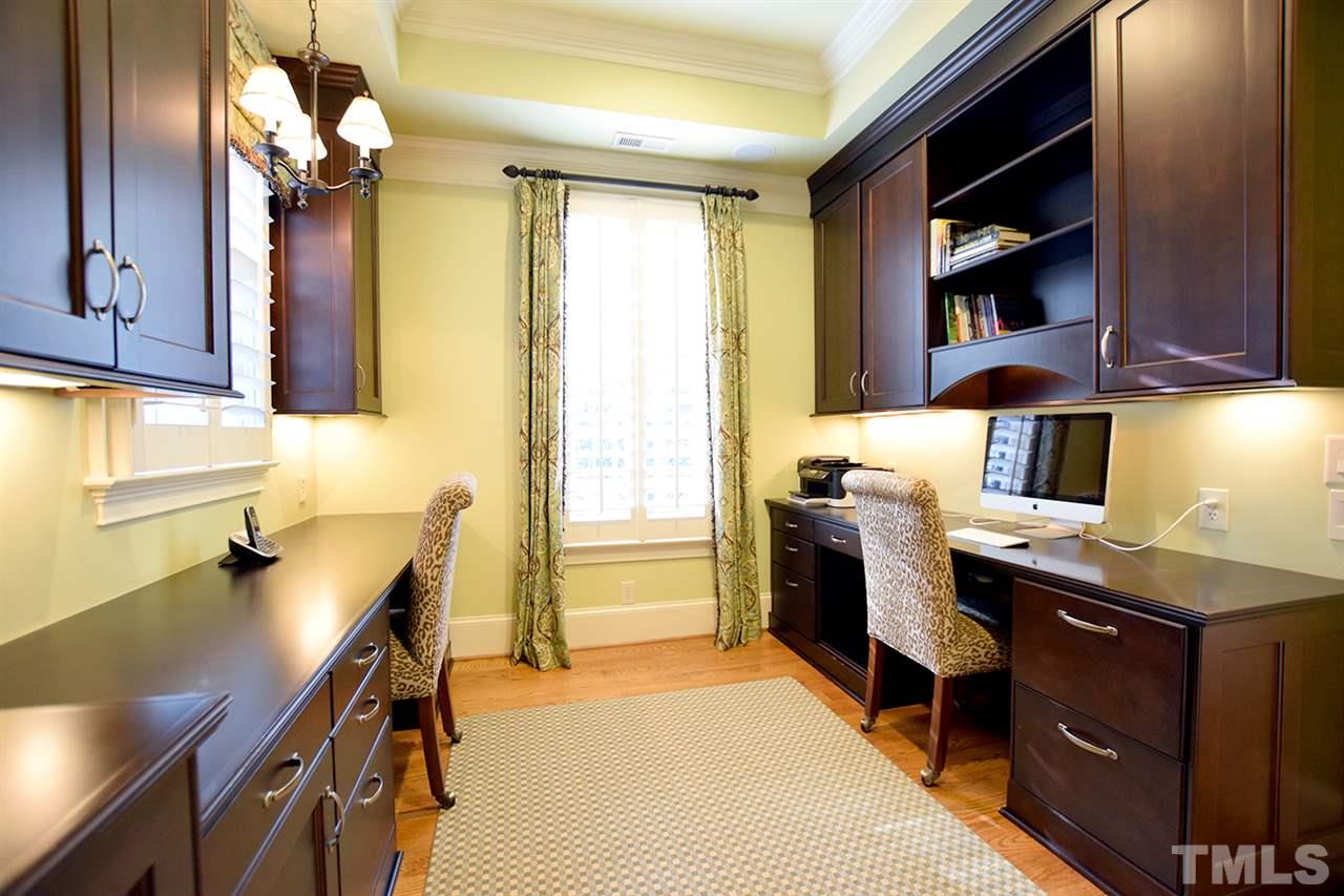 308 Marlowe Road Raleigh, NC 27609 - Photo 14 of 24 a view of a workspace with furniture and a window