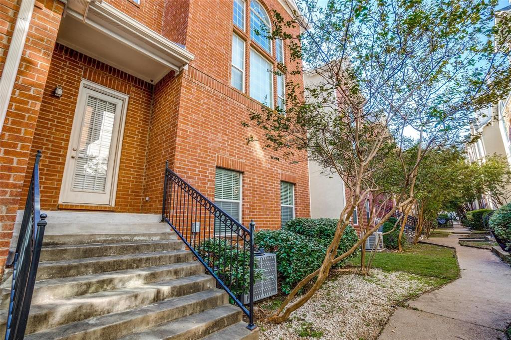 5827 Lewis Street Dallas, TX 75206 - Photo 1 of 24 a view of a house with brick walls