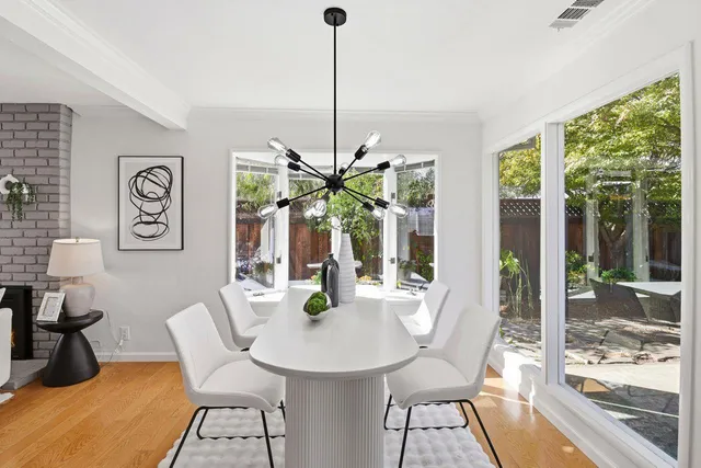 a bed room with a bed and a chair