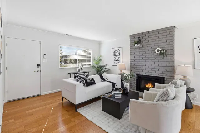 a kitchen with stainless steel appliances a refrigerator stove and microwave