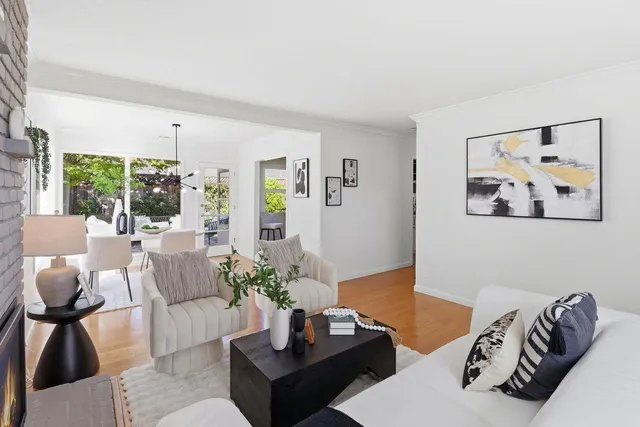 a kitchen with a stove a sink and a refrigerator