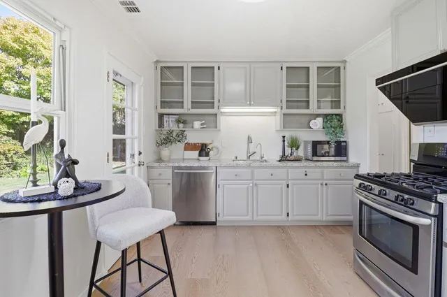 a view of a room with furniture window and outside view