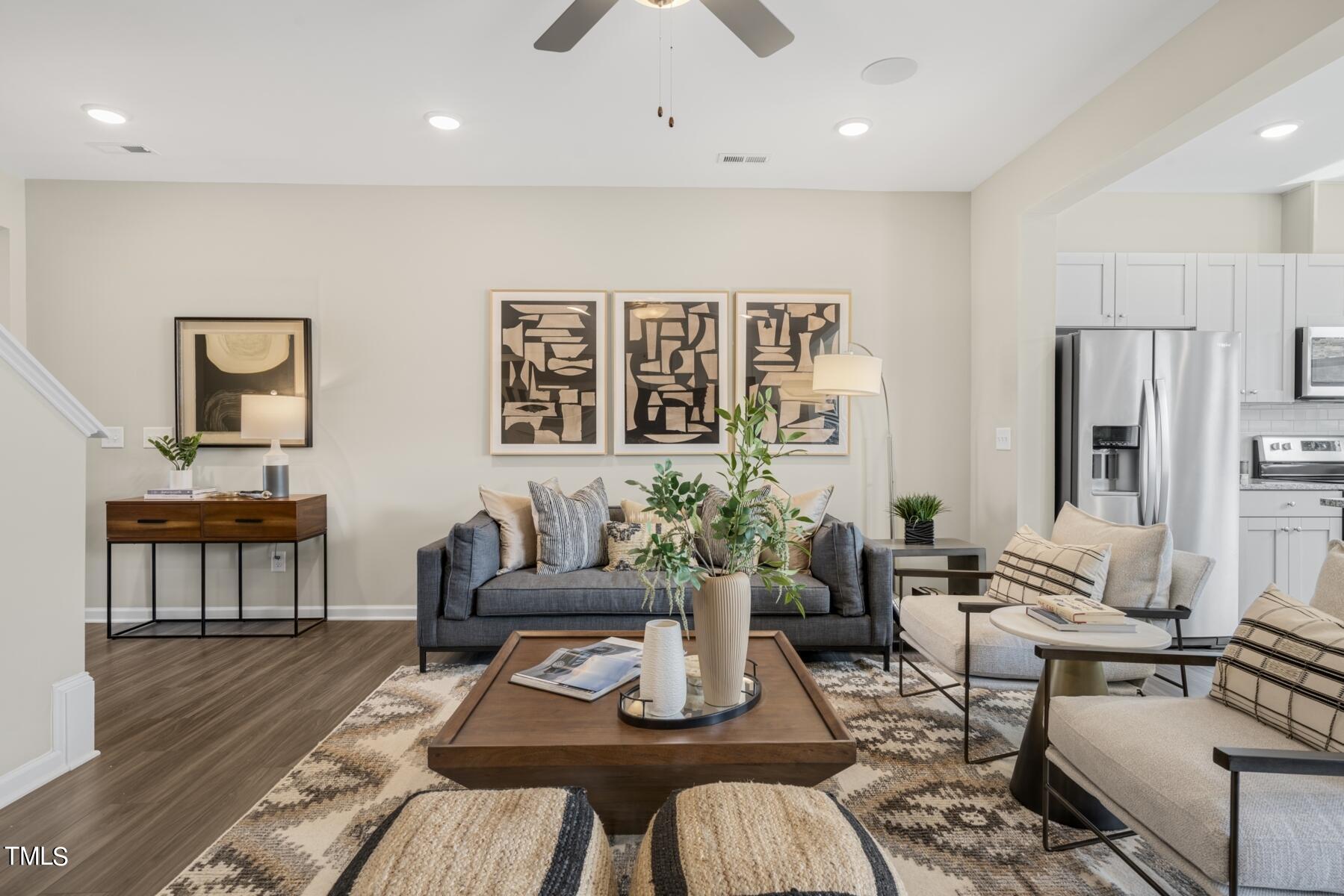 155 Siebold Street Garner, NC 27529 - Photo 23 of 70 a living room with furniture and wooden floor