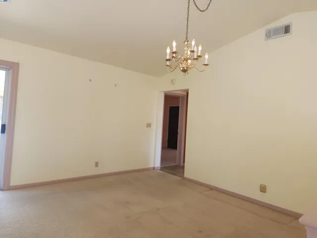 a view of a chandelier in a room