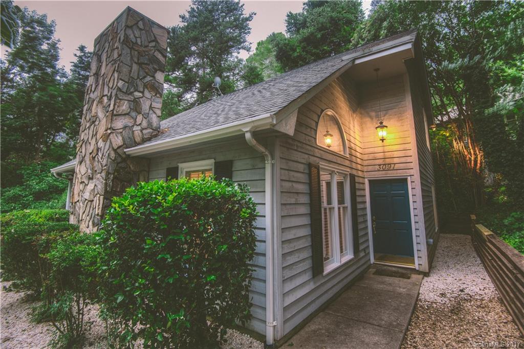 3091 Point Clear Drive Tega Cay, SC 29708 - Photo 2 of 23 a view of a house with a yard and plants