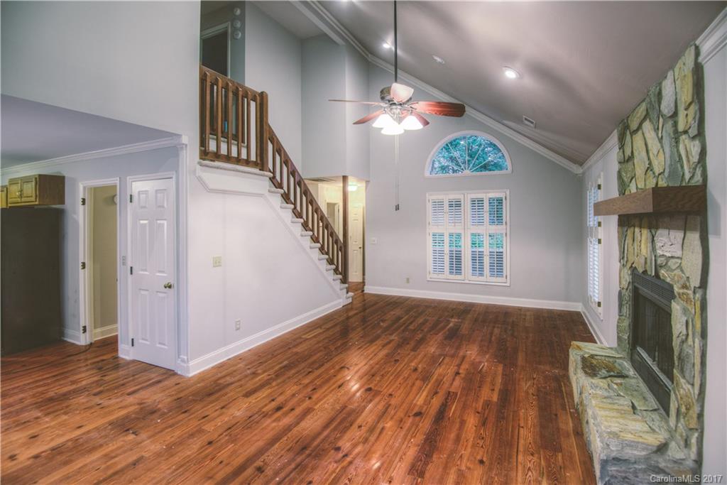 3091 Point Clear Drive Tega Cay, SC 29708 - Photo 11 of 23 a view of livingroom with hardwood floor and ceiling fan