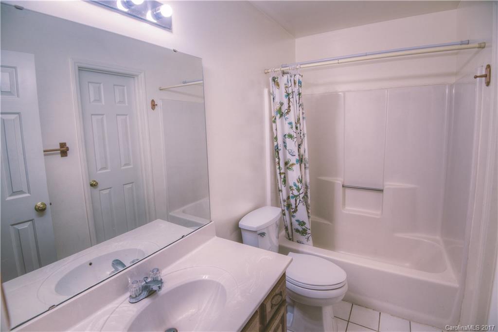 3091 Point Clear Drive Tega Cay, SC 29708 - Photo 15 of 23 a bathroom with a sink toilet and shower