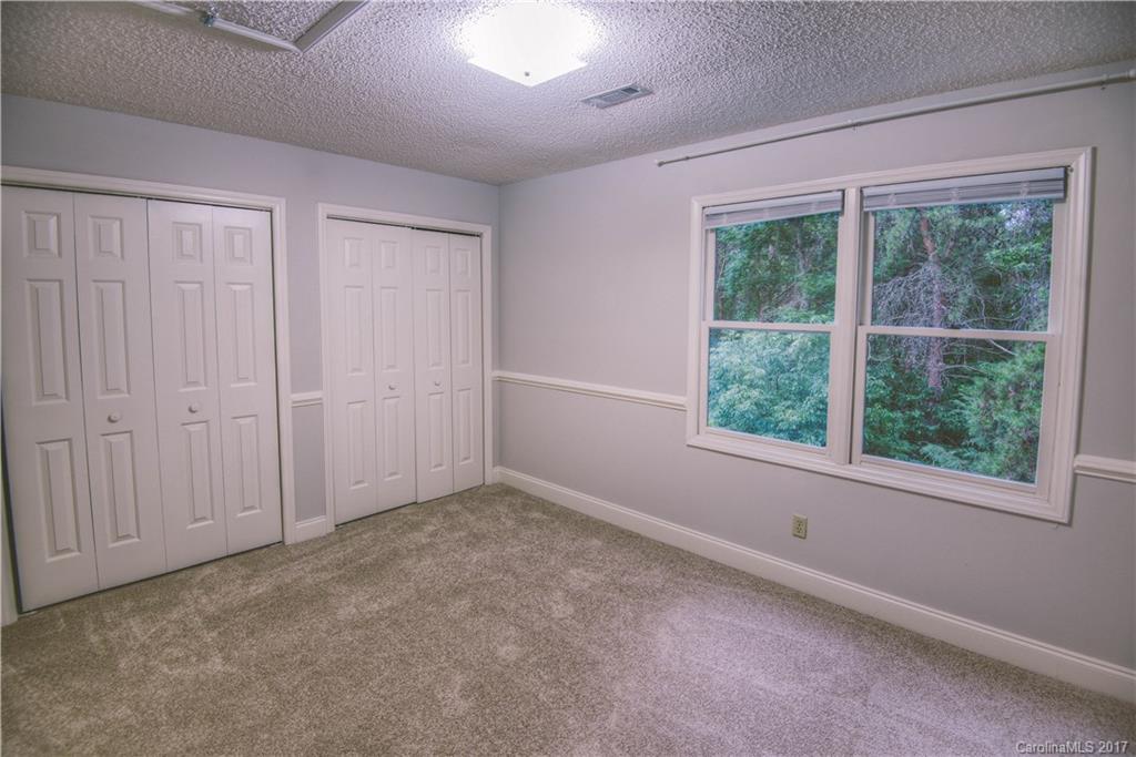 3091 Point Clear Drive Tega Cay, SC 29708 - Photo 16 of 23 an empty room with a window