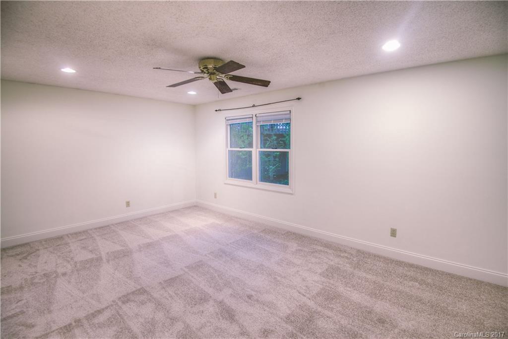 3091 Point Clear Drive Tega Cay, SC 29708 - Photo 19 of 23 a view of an empty room with a window