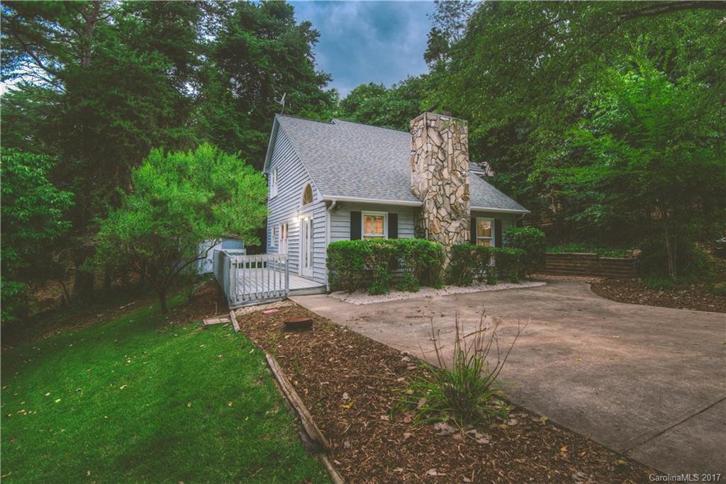 3091 Point Clear Drive Tega Cay, SC 29708 - Photo 20 of 23 a front view of a house with garden