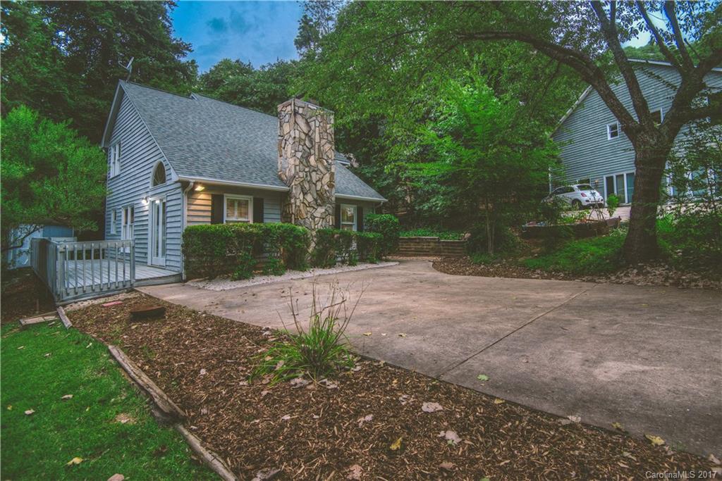 3091 Point Clear Drive Tega Cay, SC 29708 - Photo 21 of 23 a front view of a house with garden