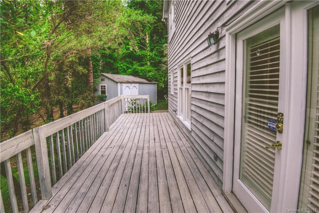 3091 Point Clear Drive Tega Cay, SC 29708 - Photo 4 of 23 a view of wooden balcony and trees