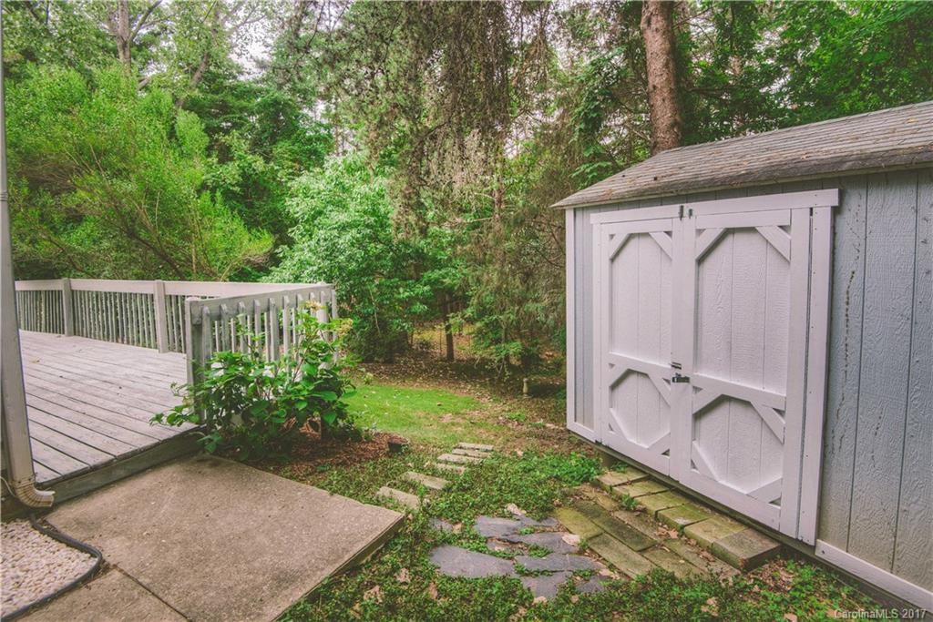 3091 Point Clear Drive Tega Cay, SC 29708 - Photo 5 of 23 a view of a entryway with a garden