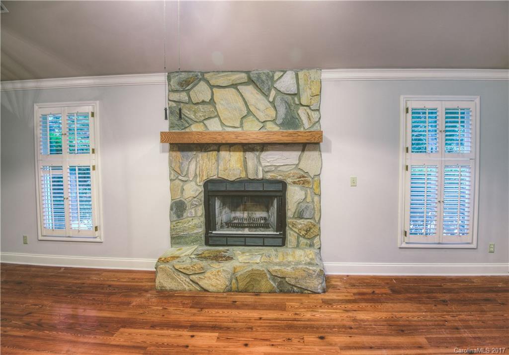 3091 Point Clear Drive Tega Cay, SC 29708 - Photo 8 of 23 a view of a fireplace in a room