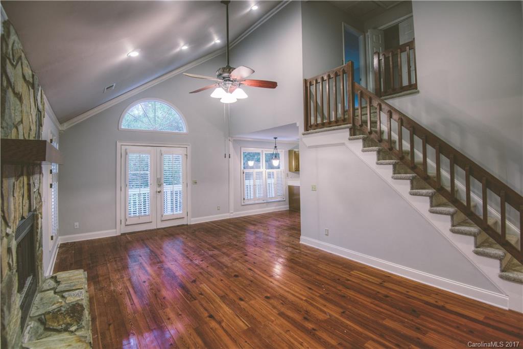 3091 Point Clear Drive Tega Cay, SC 29708 - Photo 10 of 23 wooden floor in an empty room with a window and wooden floor