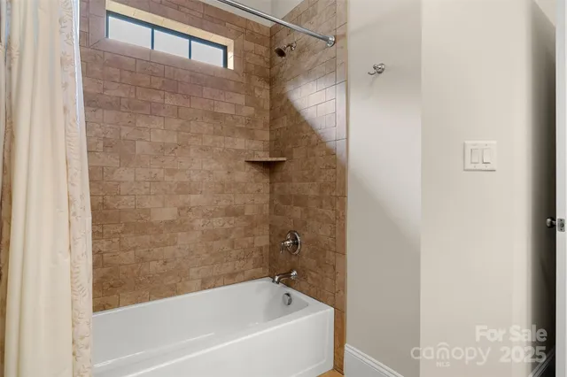 a bathroom with a bathtub