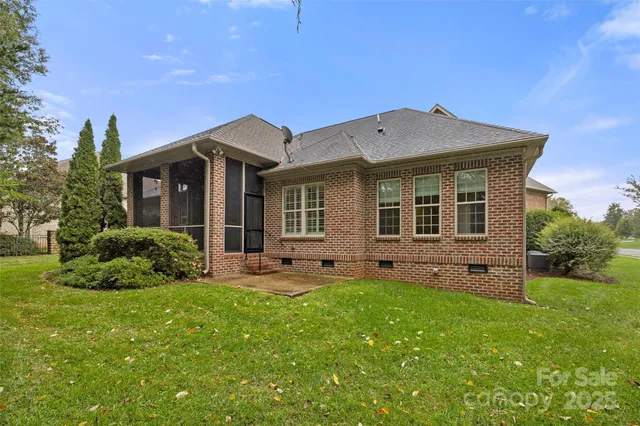 a front view of a house with a yard and porch