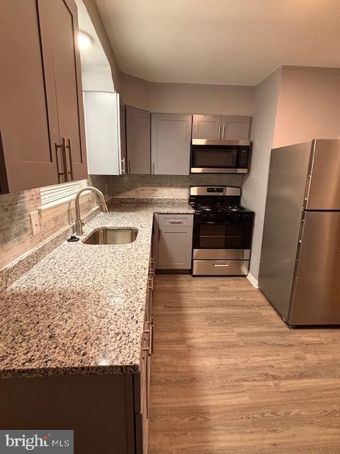 7912 Riggs Road Hyattsville, MD 20783 - Photo 8 of 40 New SS appliances, granite top & soft close cabine