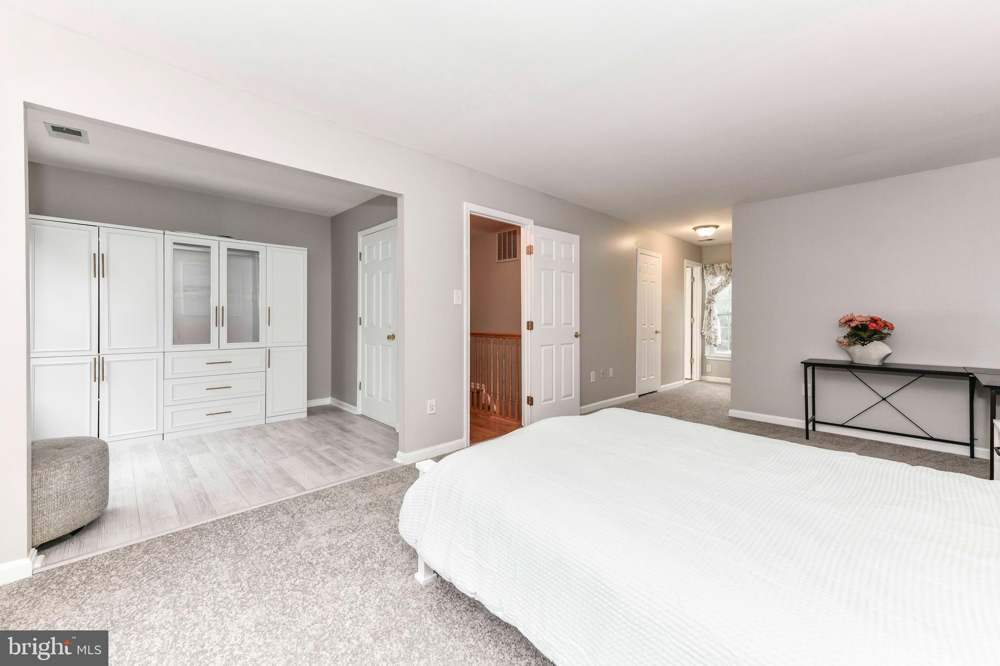 5500 Hampton Forest Way Clifton, VA 20124 - Photo 24 of 49 a spacious bedroom with a bed and a cabinets