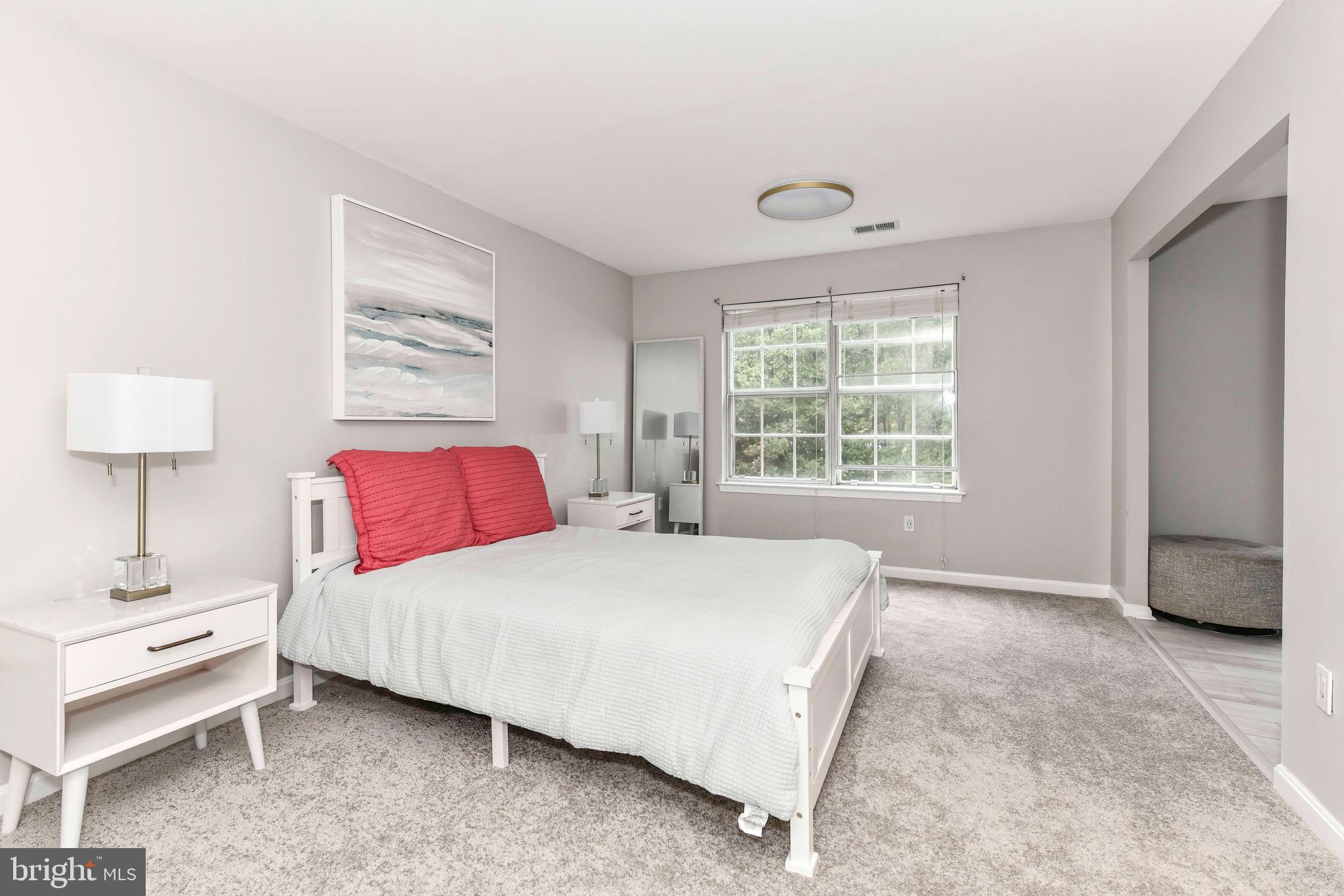 5500 Hampton Forest Way Clifton, VA 20124 - Photo 27 of 49 a bedroom with a bed and a window