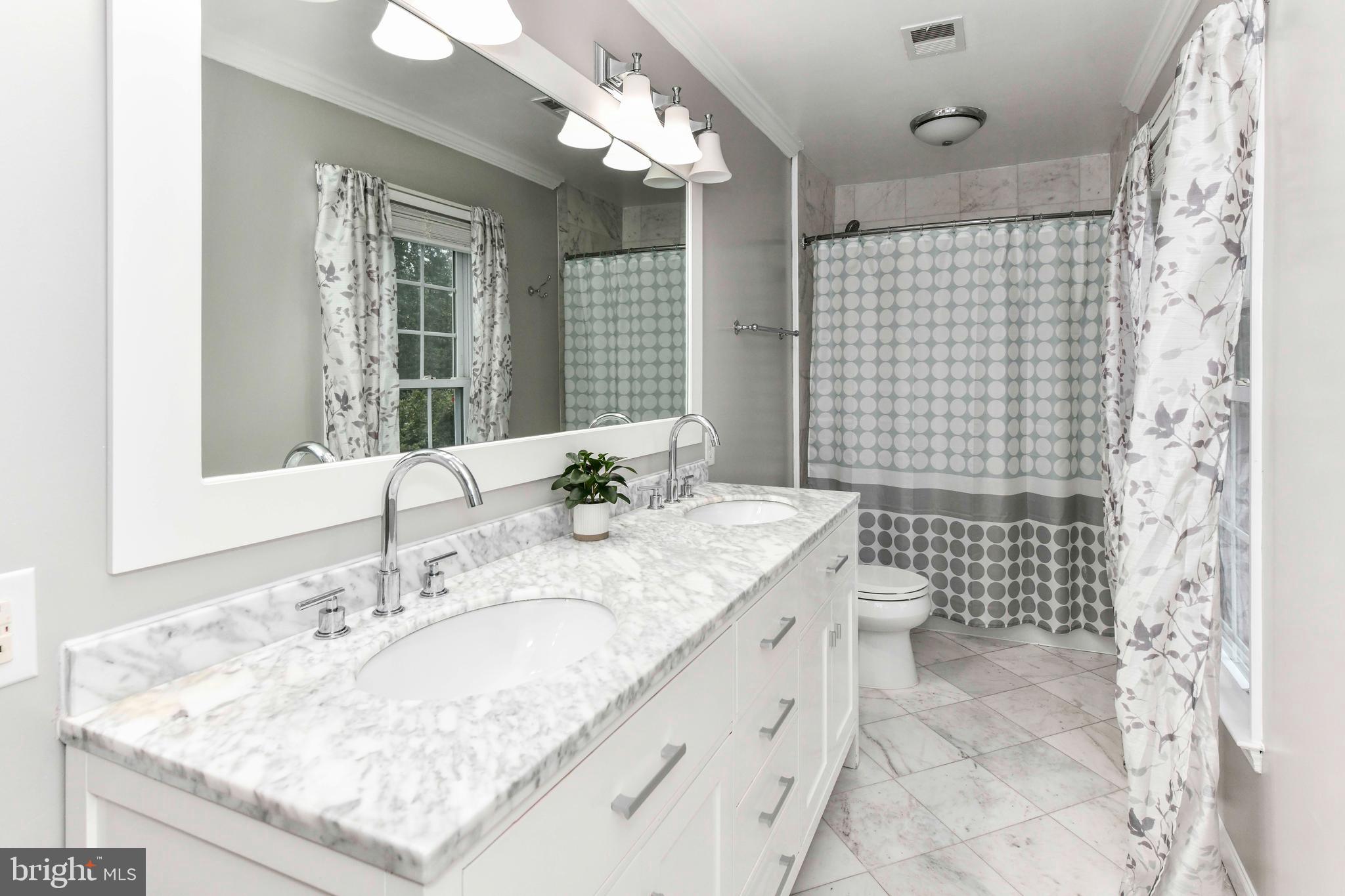 5500 Hampton Forest Way Clifton, VA 20124 - Photo 29 of 49 a bathroom with a sink toilet and shower