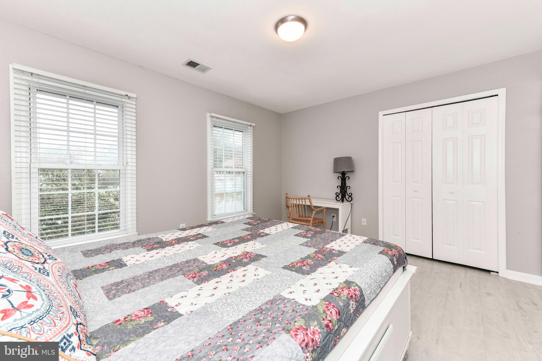 5500 Hampton Forest Way Clifton, VA 20124 - Photo 32 of 49 a bedroom with a bed and a window