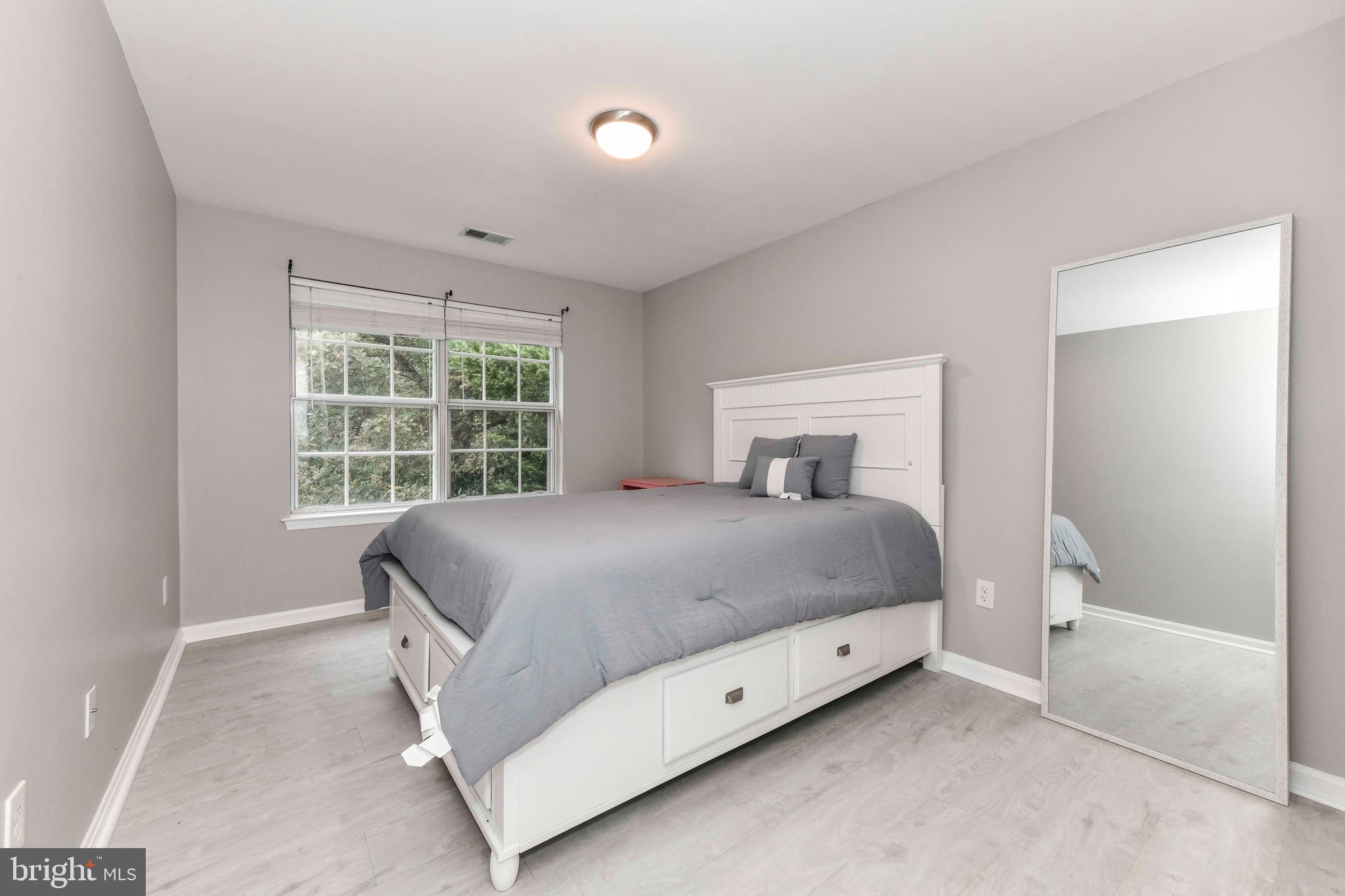 5500 Hampton Forest Way Clifton, VA 20124 - Photo 33 of 49 a bedroom with a bed and a window