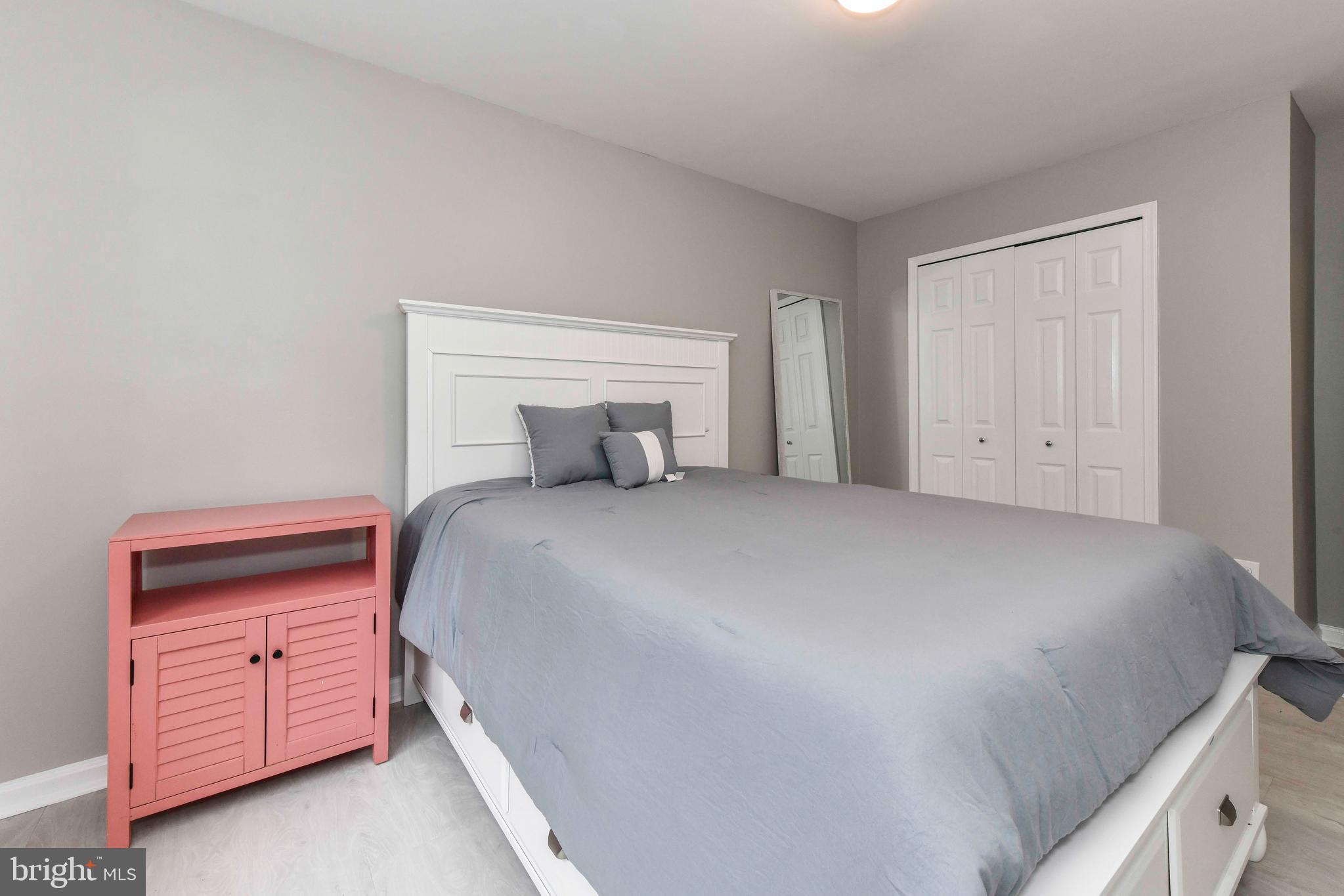 5500 Hampton Forest Way Clifton, VA 20124 - Photo 34 of 49 a bedroom with a bed and a dresser