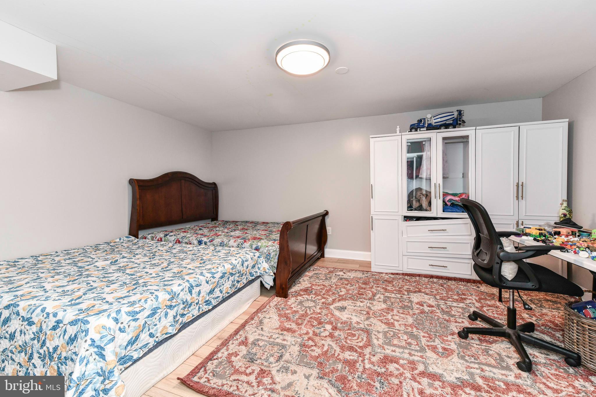 5500 Hampton Forest Way Clifton, VA 20124 - Photo 37 of 49 a bedroom with a bed and a desk