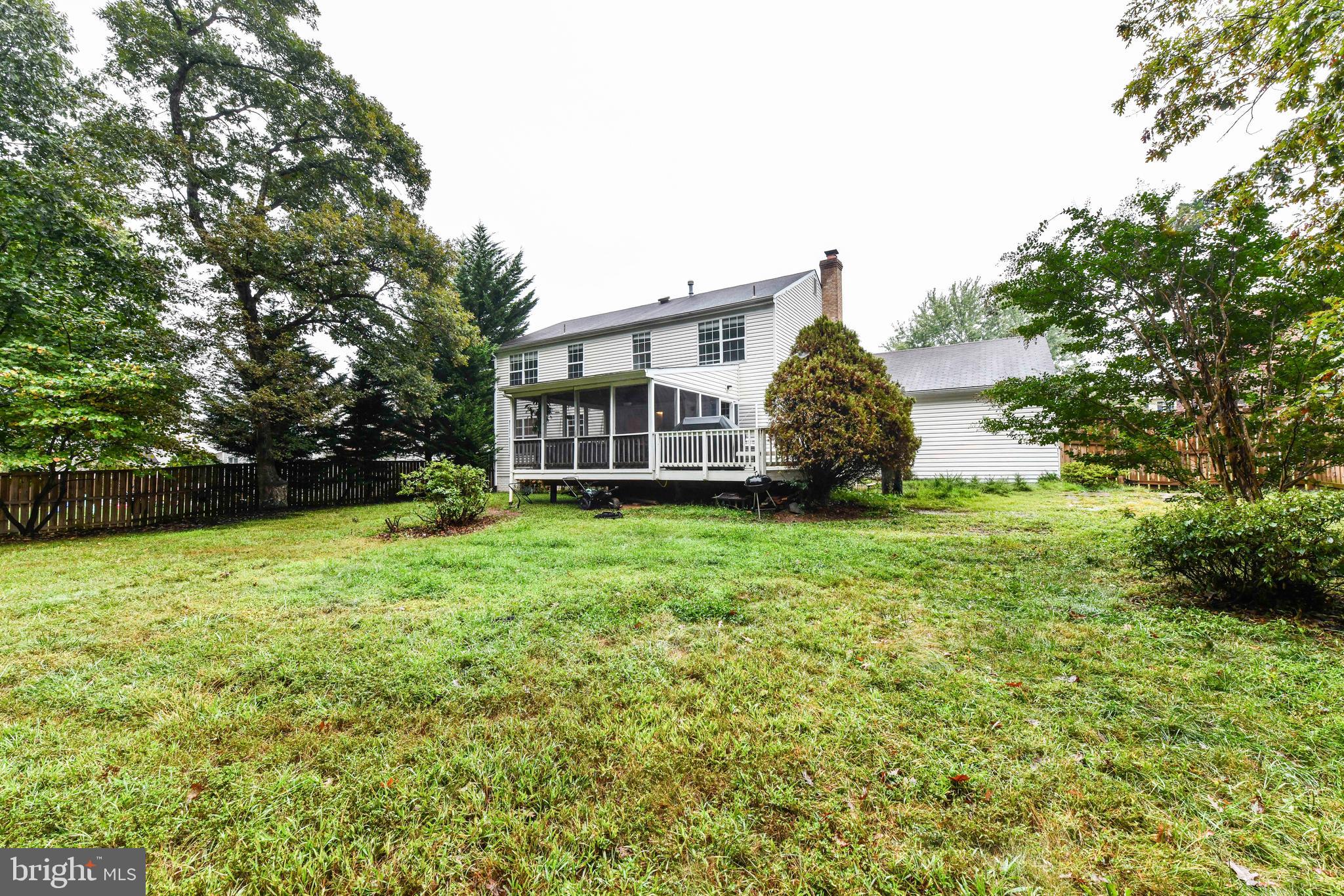 5500 Hampton Forest Way Clifton, VA 20124 - Photo 45 of 49 a view of a house with backyard and garden