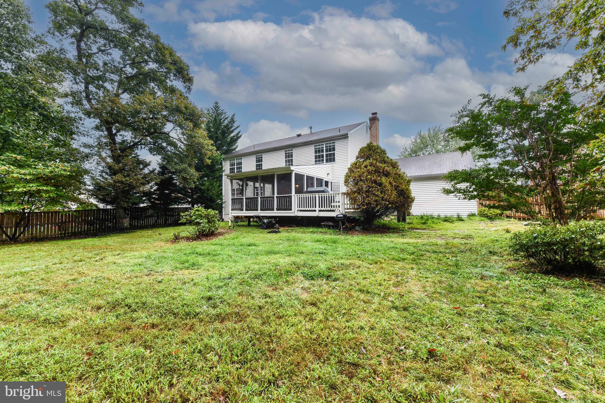 5500 Hampton Forest Way Clifton, VA 20124 - Photo 46 of 49 a view of a house with backyard and garden