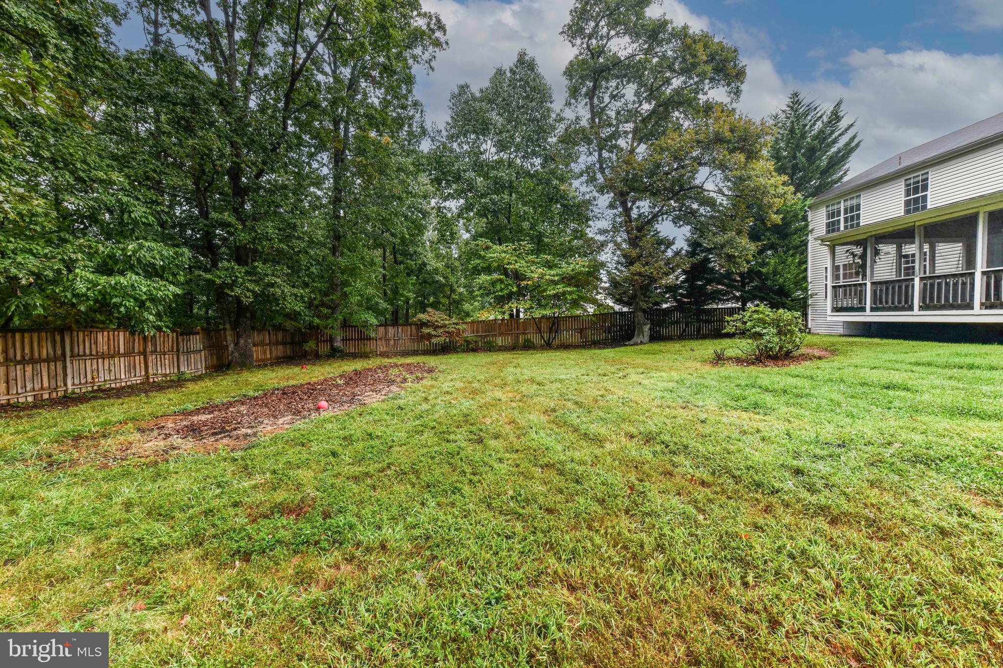 5500 Hampton Forest Way Clifton, VA 20124 - Photo 47 of 49 a view of a house with a yard