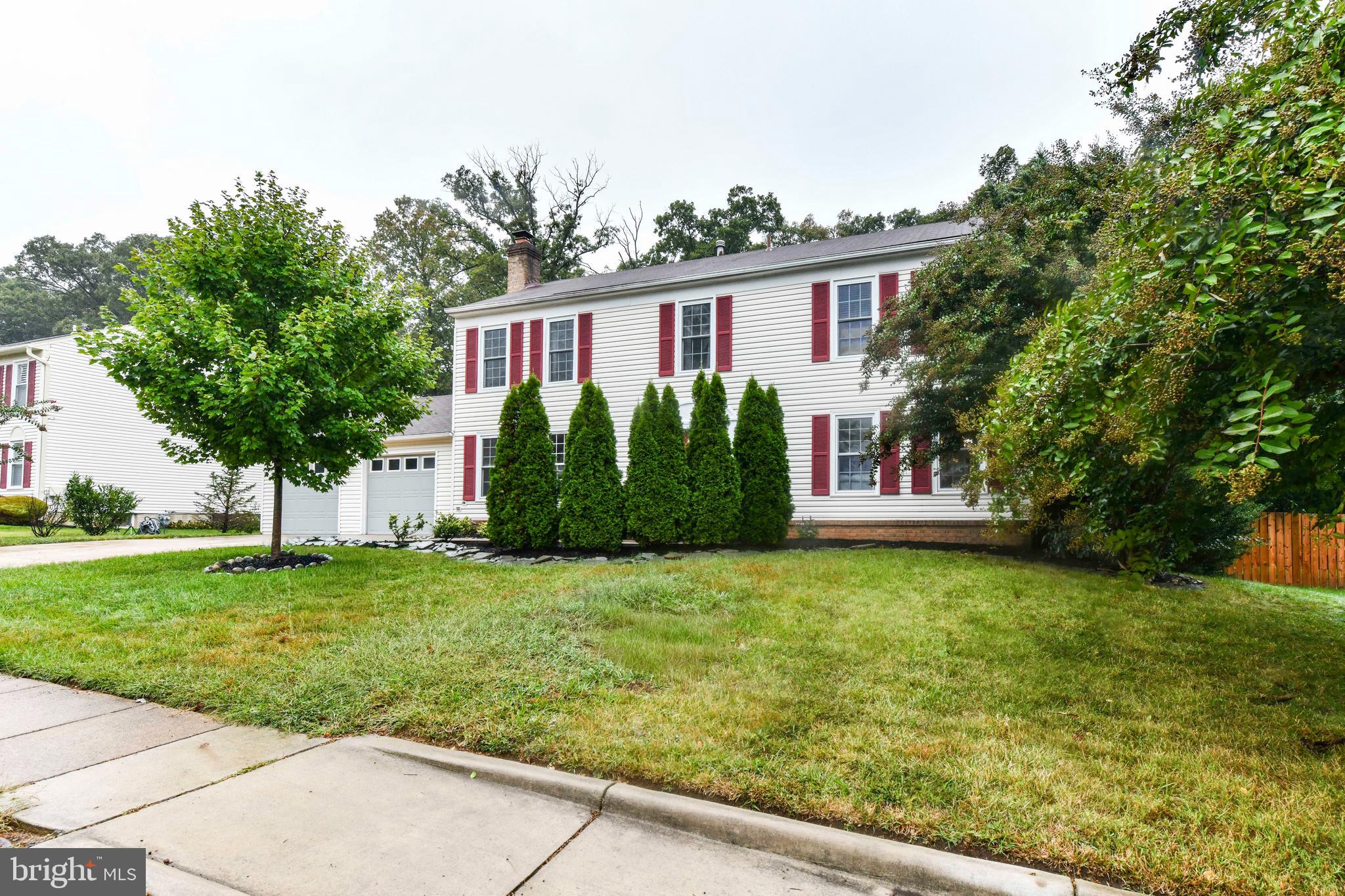 5500 Hampton Forest Way Clifton, VA 20124 - Photo 49 of 49 a view of a house with a yard and plants