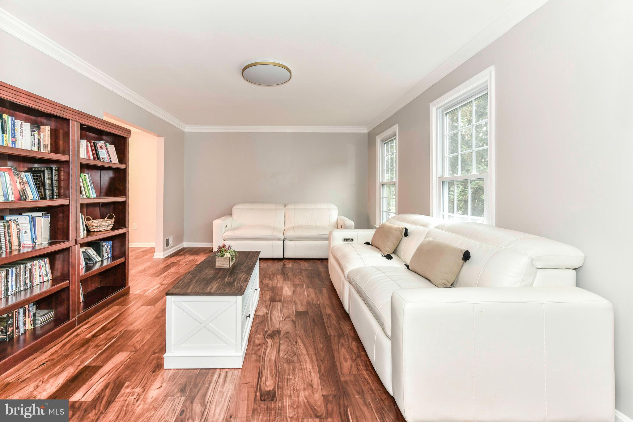 5500 Hampton Forest Way Clifton, VA 20124 - Photo 8 of 49 a bed room with a bed and a book shelf