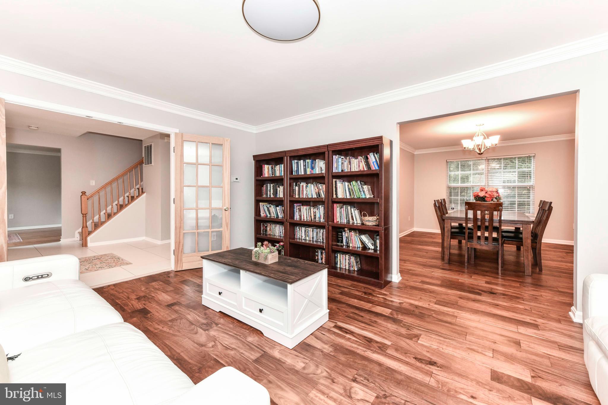 5500 Hampton Forest Way Clifton, VA 20124 - Photo 10 of 49 a living room with furniture and a wooden floor