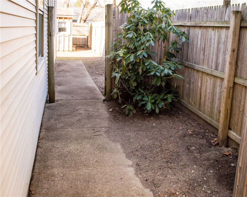 26 Pinehurst Road East Providence, RI 02915 - Photo 6 of 40 Double gated side entry/alley to back yard