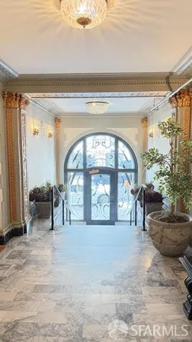 a view of front door with outdoor seating