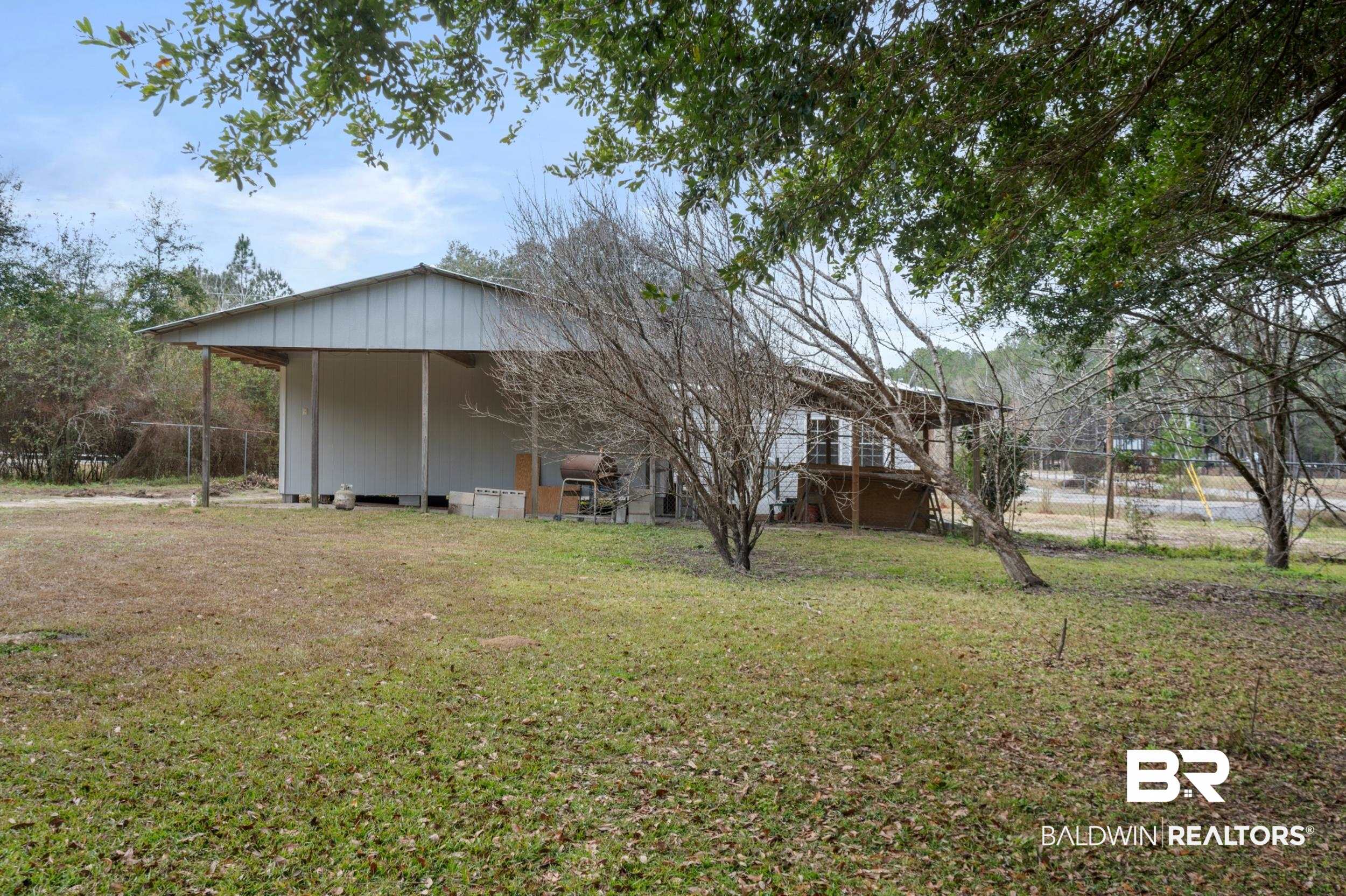 35780 Spring Road North Stapleton, AL 36578 - Photo 37 of 41 View of yard featuring a wooden deck