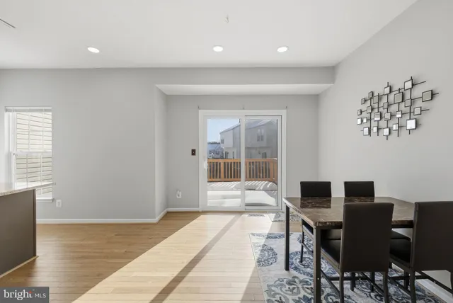 a workspace with furniture hardwood and a window