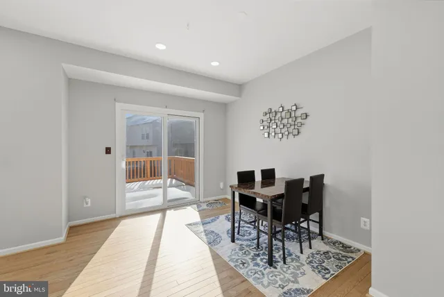 a kitchen with stainless steel appliances kitchen island granite countertop a sink and cabinets